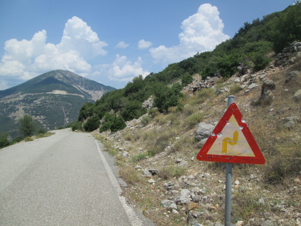 Using road signs as target practice is common place in these wild lands